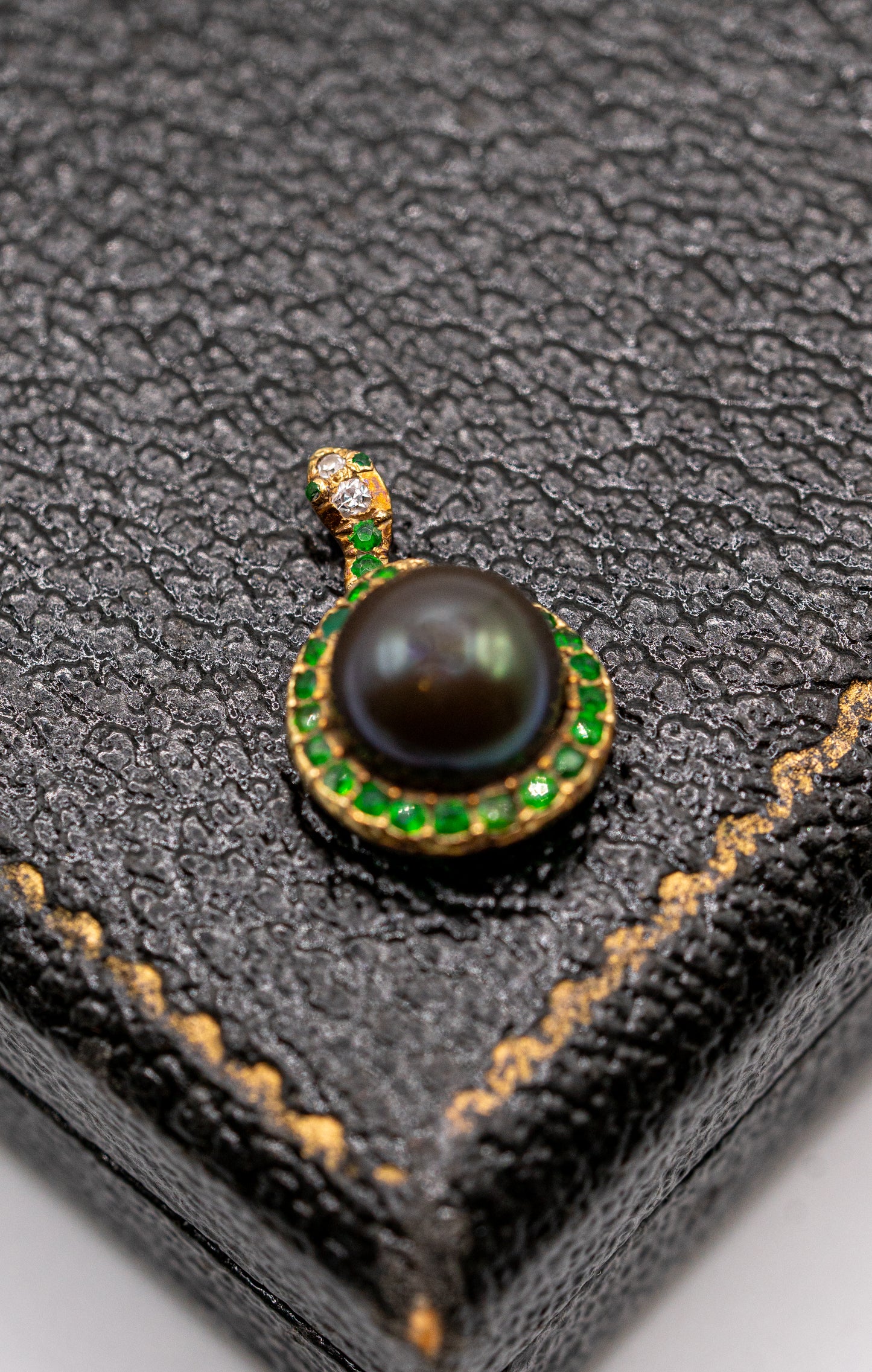 Antique 14k black pearl diamond and tsavorite snake ring